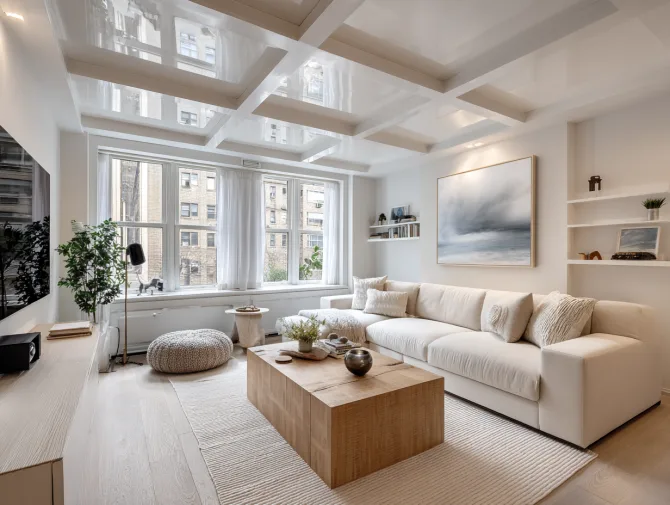 Modern Santa Monica living room with soundproofed coffered ceiling and city views through windows