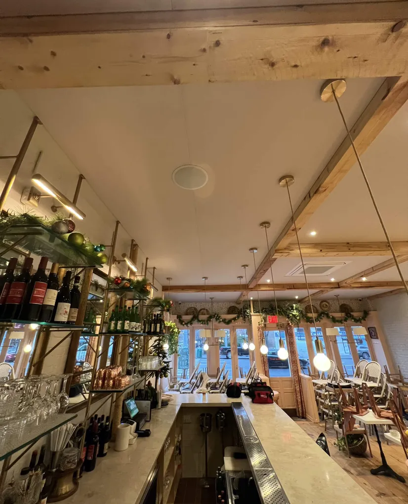 Continuous Fabric Acoustic Ceiling Between Wood Beams